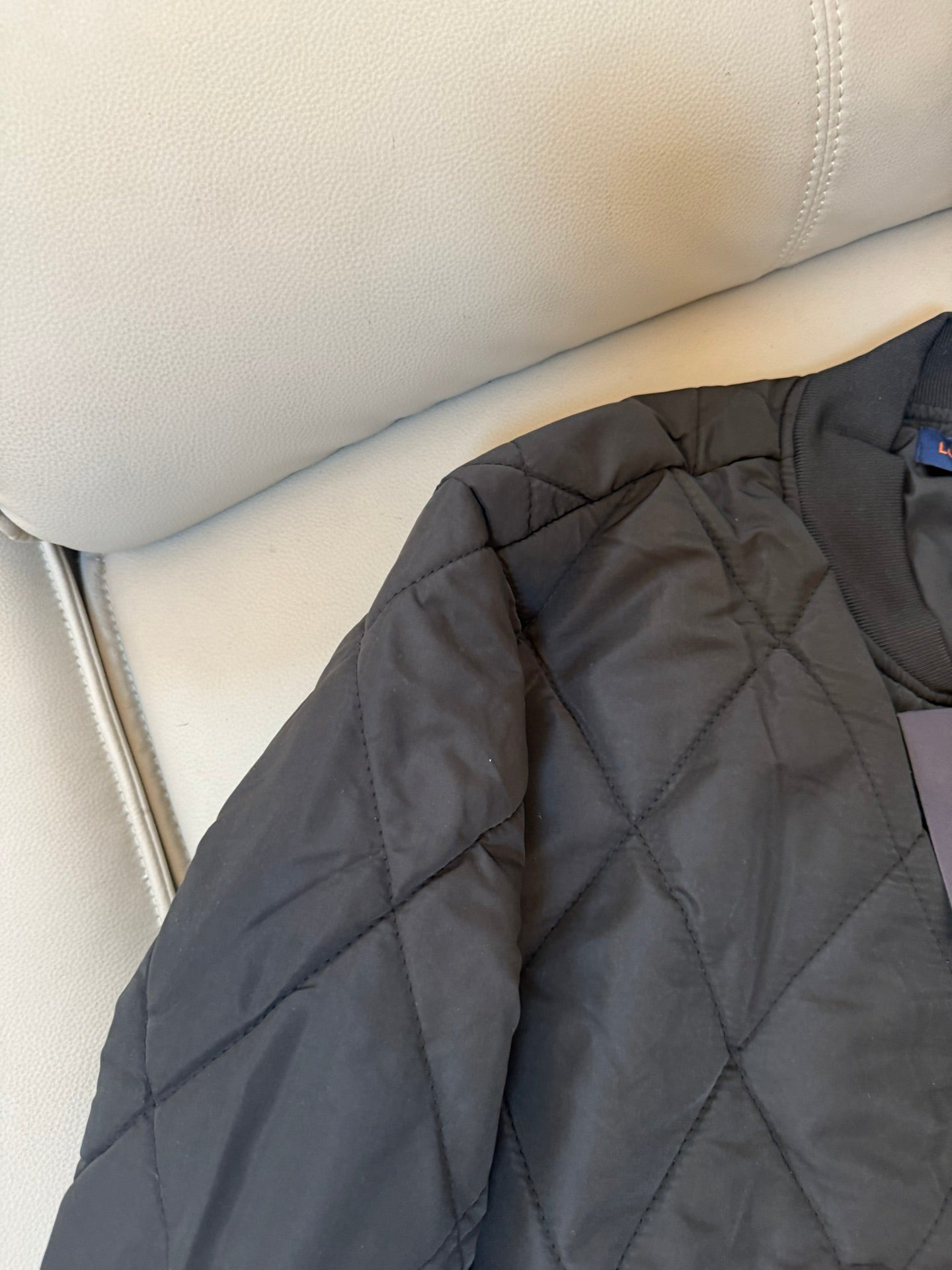 Louis Vuitton Unisex Dark Embroidered Puffer Jacket – Relaxed Fit, Everyday Elegance