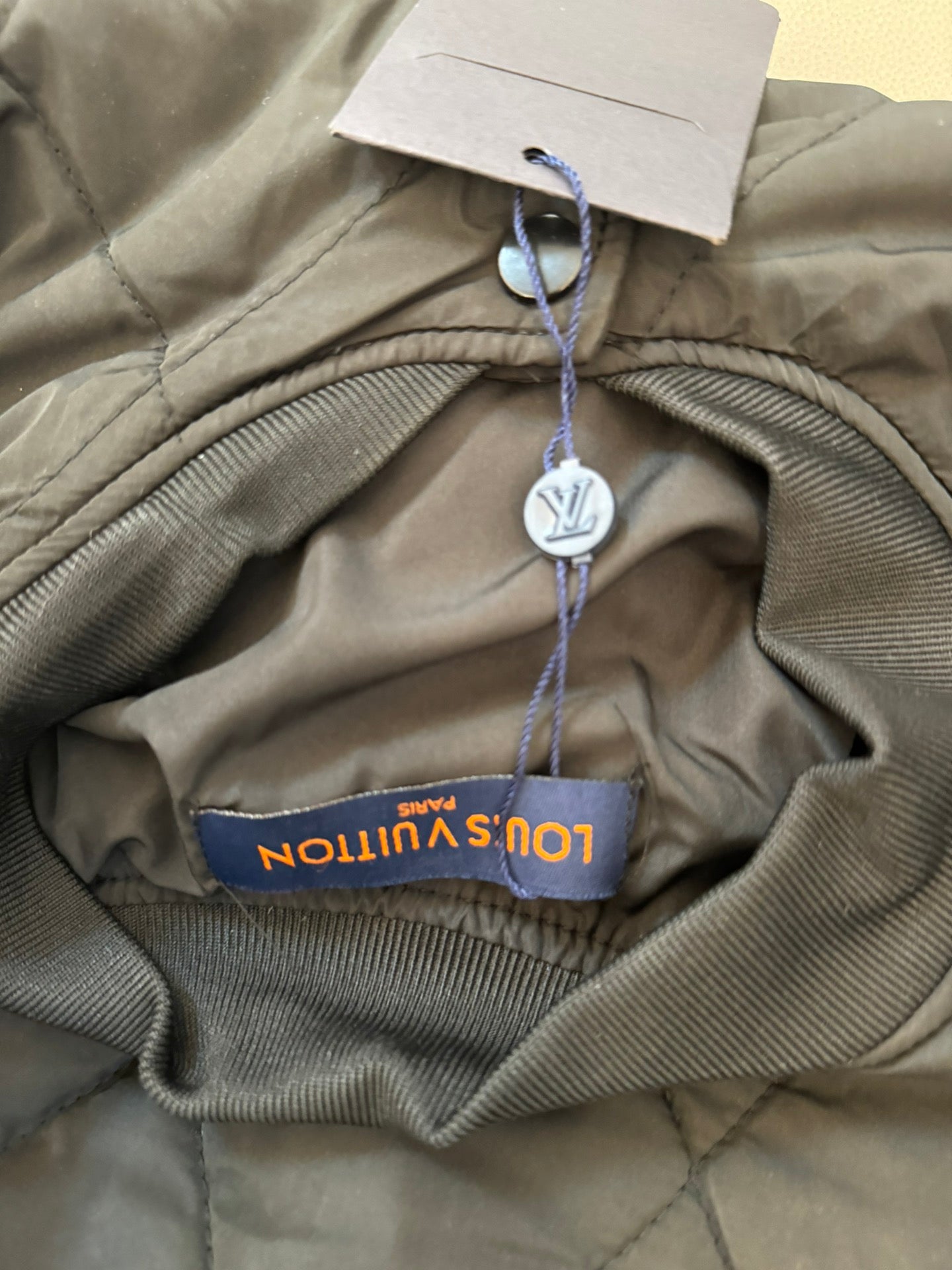 Louis Vuitton Unisex Dark Embroidered Puffer Jacket – Relaxed Fit, Everyday Elegance