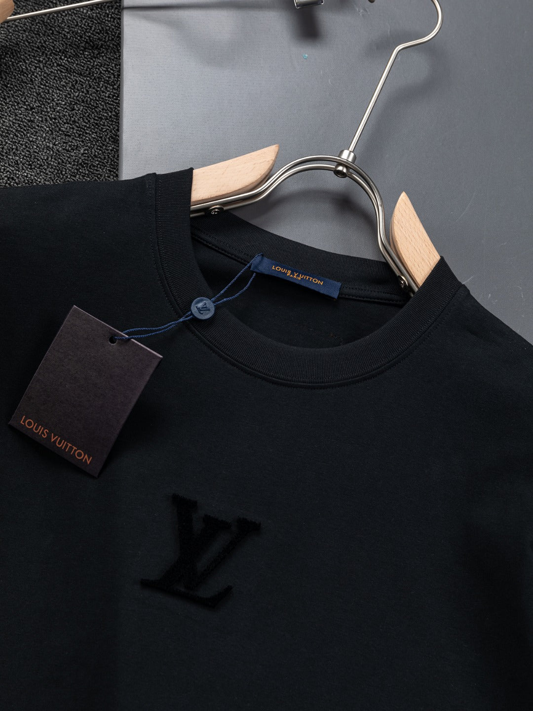 Louis Vuitton 1V 25 Early Spring Embossed Letter T-Shirt – XS, S, M, L – Unisex Premium Cotton Tee