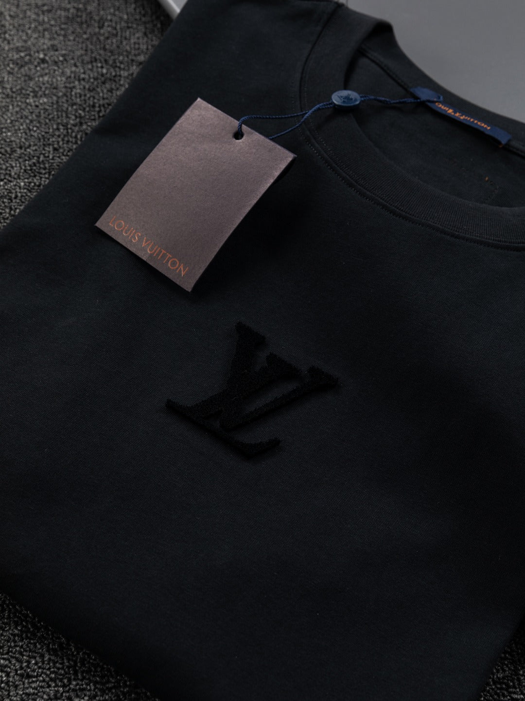 Louis Vuitton 1V 25 Early Spring Embossed Letter T-Shirt – XS, S, M, L – Unisex Premium Cotton Tee