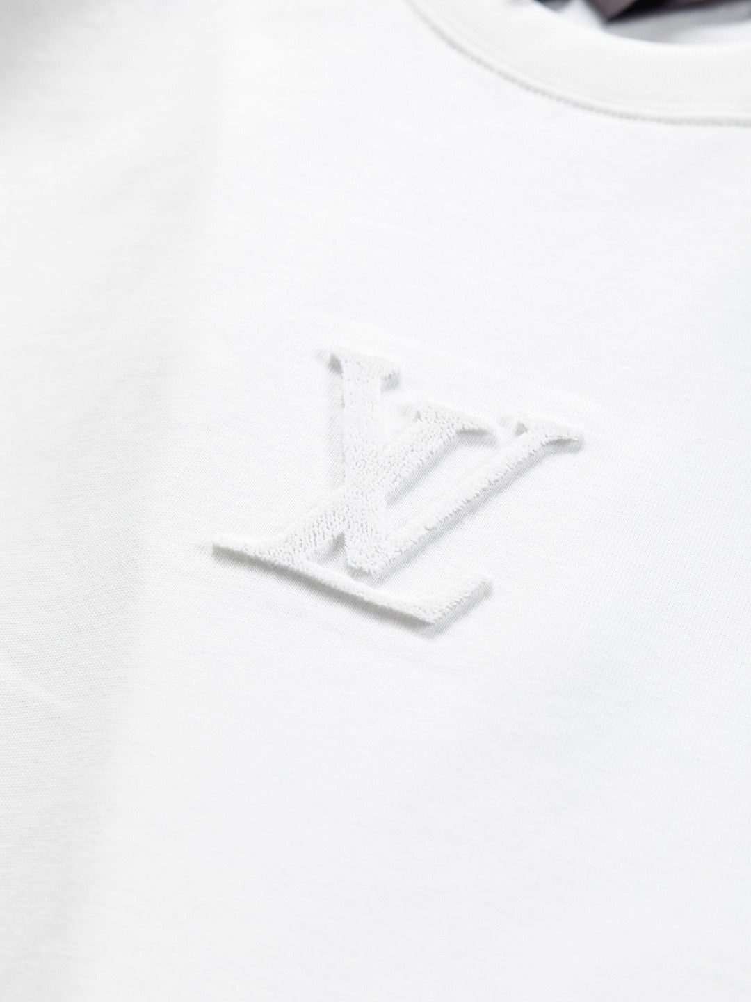 Louis Vuitton 1V 25 Early Spring Embossed Letter T-Shirt – XS, S, M, L – Unisex Premium Cotton Tee