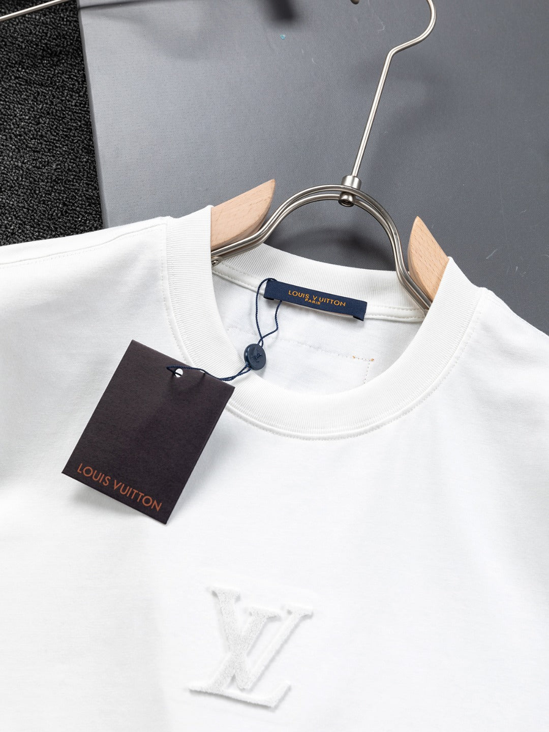 Louis Vuitton 1V 25 Early Spring Embossed Letter T-Shirt – XS, S, M, L – Unisex Premium Cotton Tee