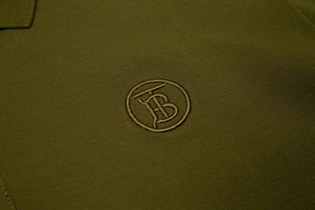 BURBERRY Men’s Classic TB Monogram Embroidered Polo Shirt – Black | Sizes M–3XL
