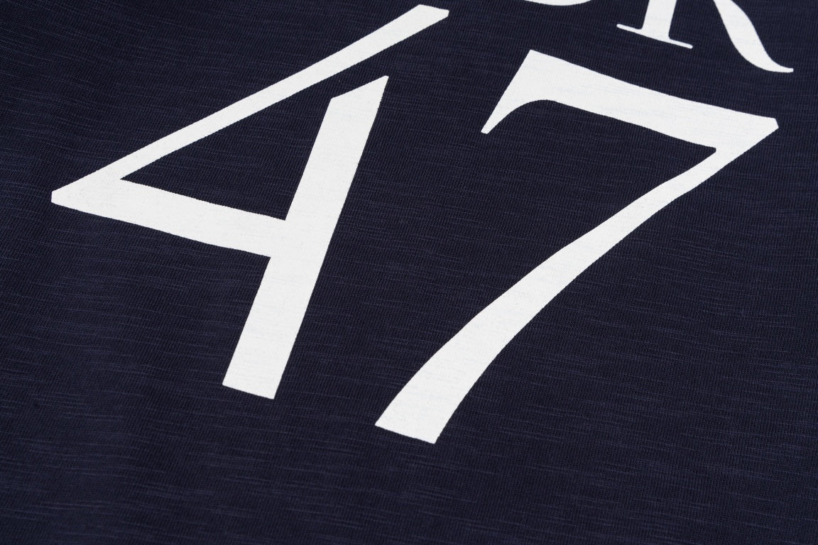 Elevate your wardrobe with the DIOR SS24 “47” Logo Print T-Shirt, a modern staple crafted with Dior’s signature precision and luxury.