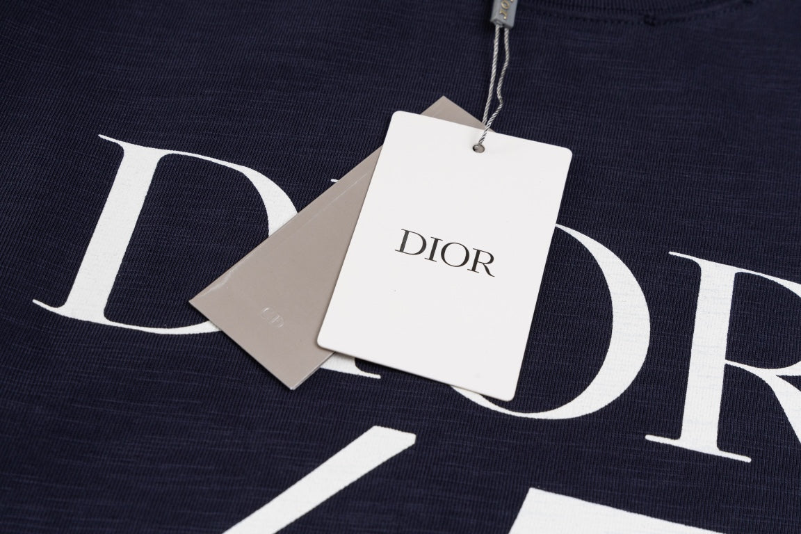 Elevate your wardrobe with the DIOR SS24 “47” Logo Print T-Shirt, a modern staple crafted with Dior’s signature precision and luxury.