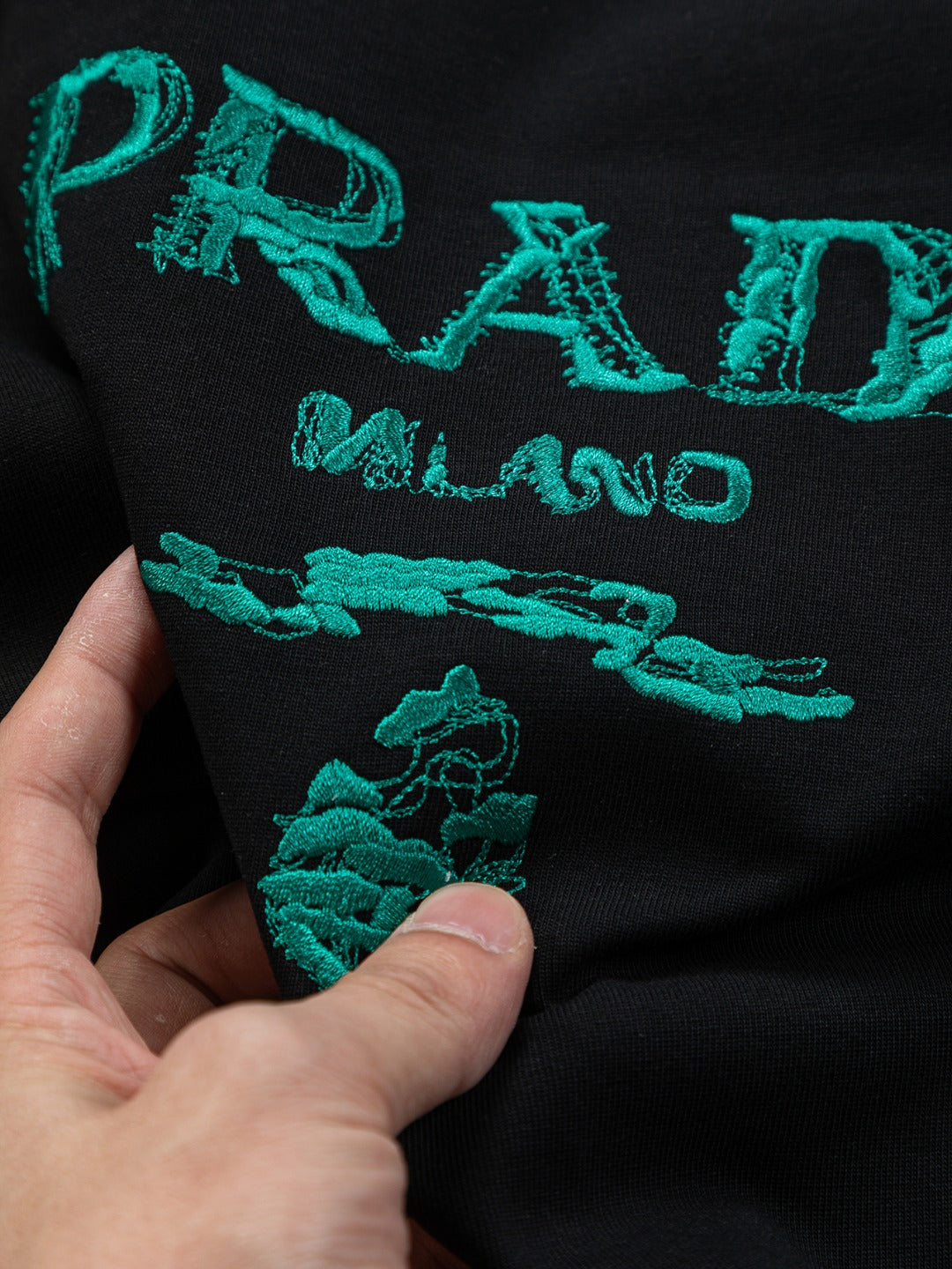 PRADA 25SS Oversized Embroidered Logo T-Shirt with Metal Triangle Badge | S–XL