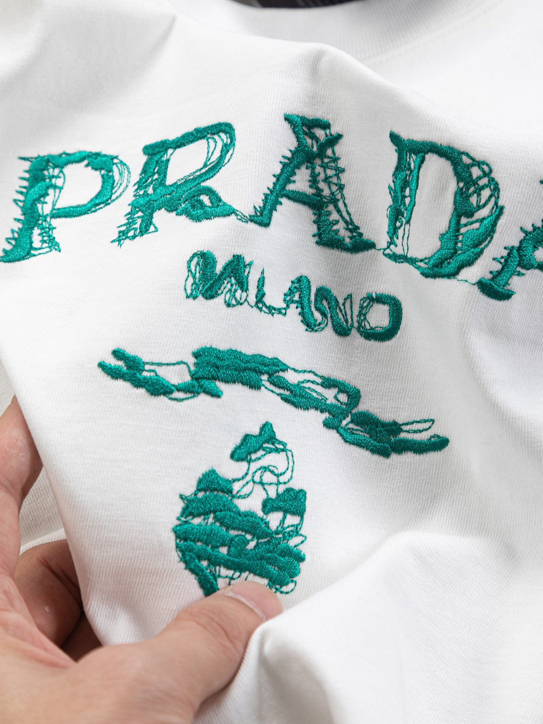 PRADA 25SS Oversized Embroidered Logo T-Shirt with Metal Triangle Badge | S–XL