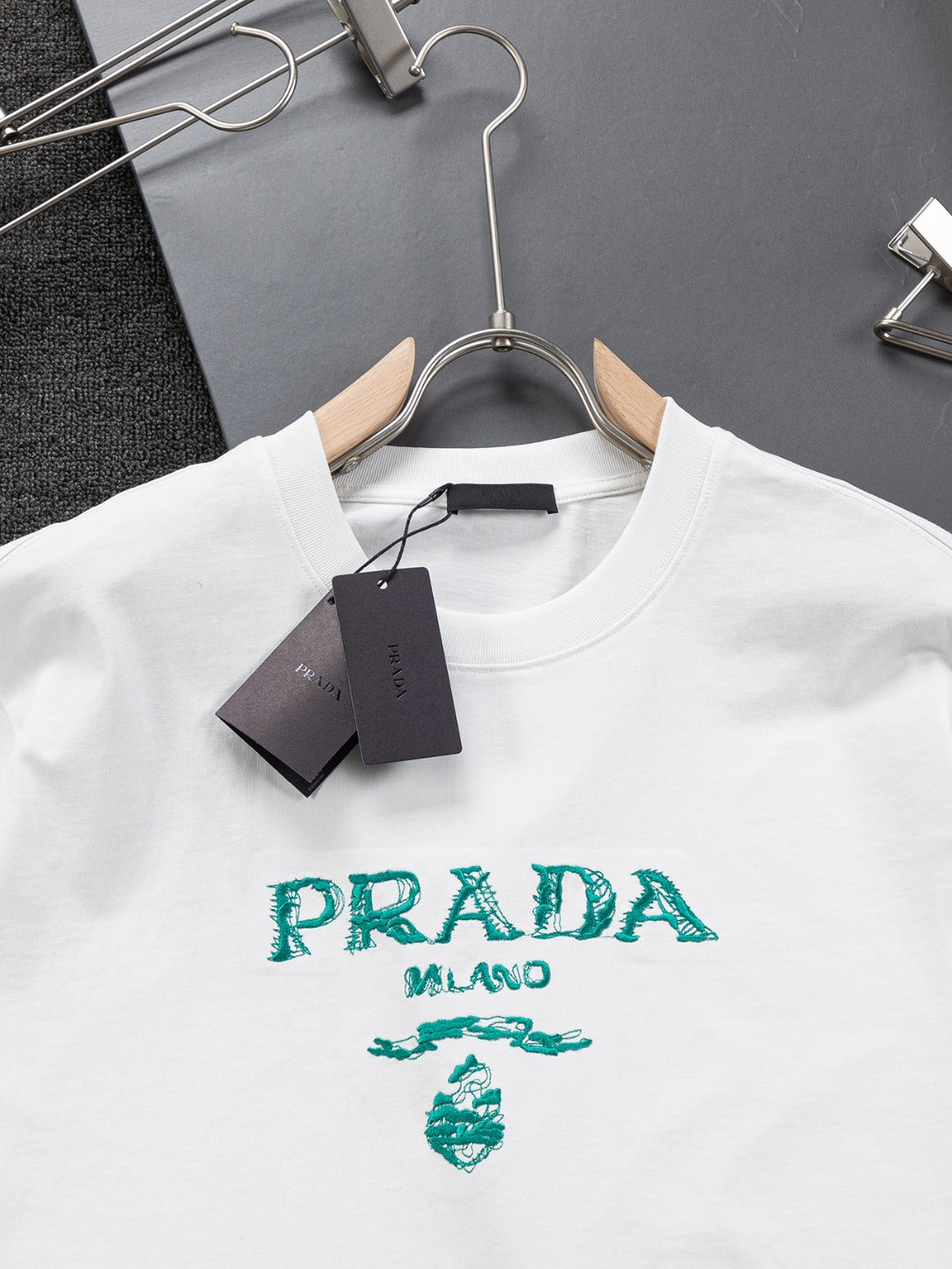 PRADA 25SS Oversized Embroidered Logo T-Shirt with Metal Triangle Badge | S–XL