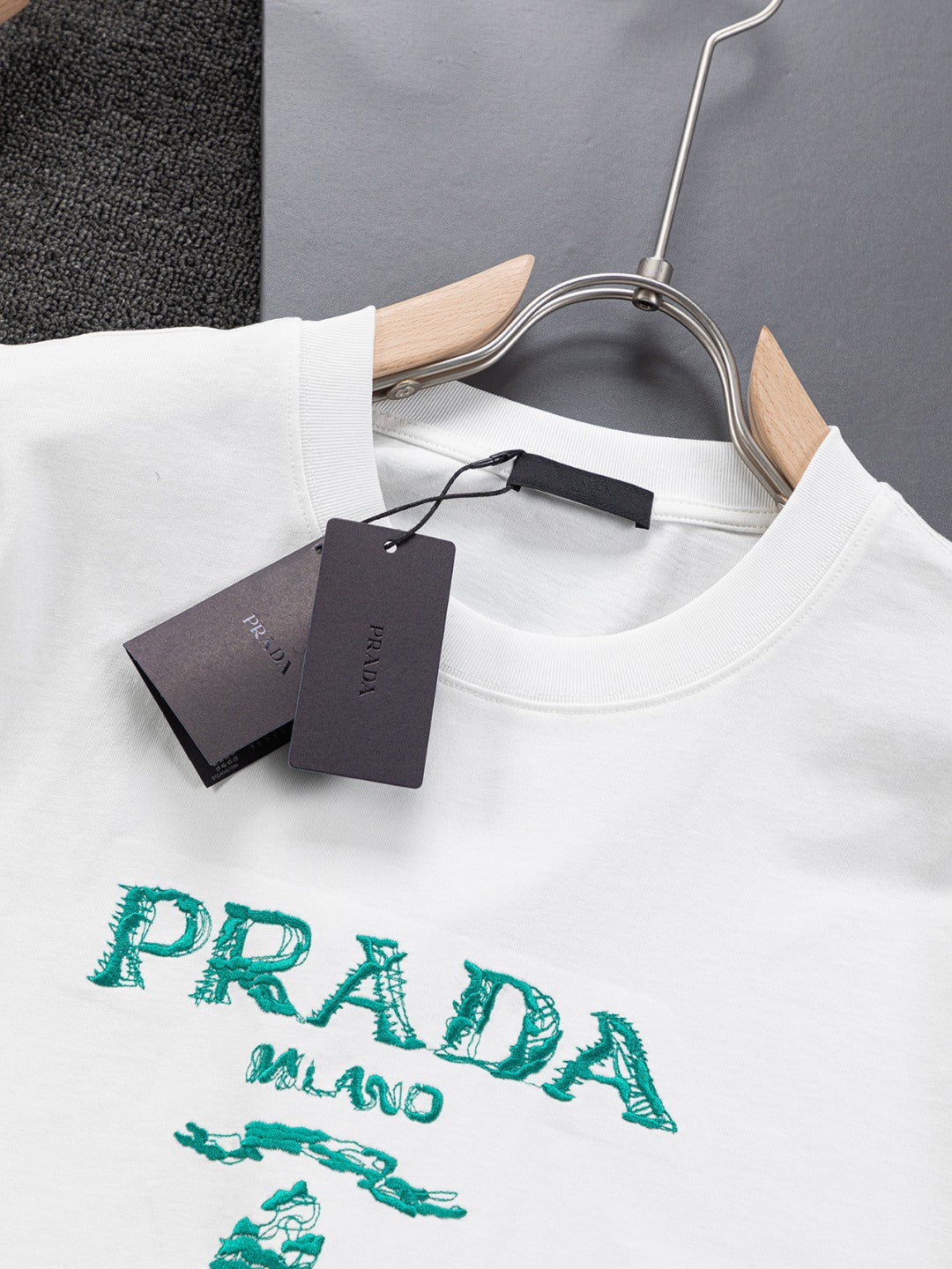 PRADA 25SS Oversized Embroidered Logo T-Shirt with Metal Triangle Badge | S–XL